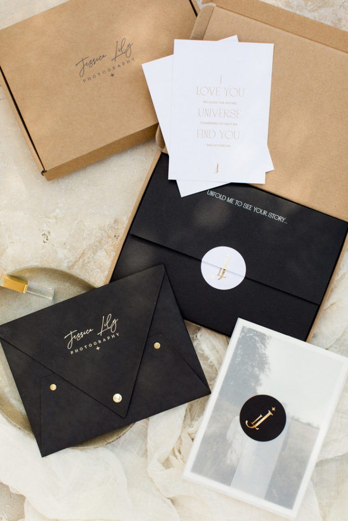 Image of Photography packaging for a wedding photographer. Black print pouch, designed to hold fine art prints.