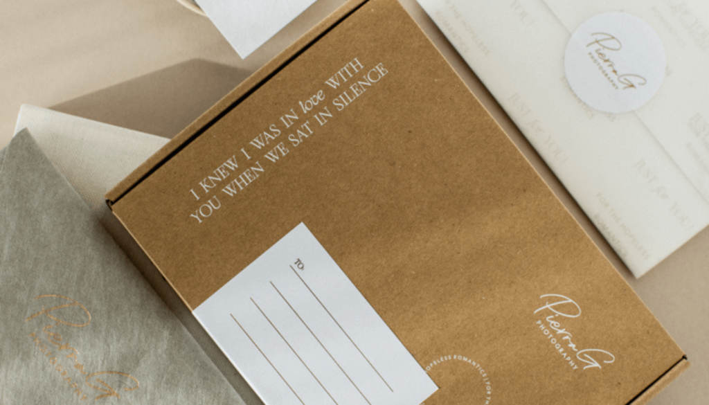 Image of a Kraft shipping box containing a welcome gift for photographers